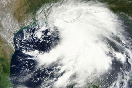 A satellite image shows Tropical Storm Lee extending from the Yucatan Peninsula across the Gulf of Mexico and over southern Louisiana, Mississippi and Alabama
