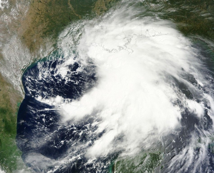 A satellite image shows Tropical Storm Lee extending from the Yucatan Peninsula across the Gulf of Mexico and over southern Louisiana, Mississippi and Alabama