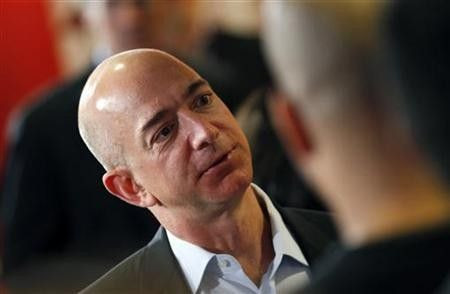 Amazon.com President, Chief Executive and Chairman Jeffrey Bezos speaks with employers and attendees at the Consumer Reports headquarters in Yonkers, New York.