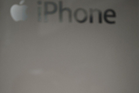 An Apple iPhone 3GS sits on a cradle at a Singtel showroom ahead of the phone launch this evening in Singapore 10/07/2009