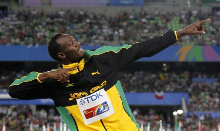 Gold medallist Usain Bolt of Jamaica poses during the award ceremony for the men&#039;s 200 metres final at the IAAF World Athletics Championships in Daegu