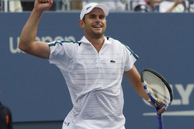 Andy Roddick of the U.S. celebrates his win over Julien Benneteau of France during their match at the U.S. Open tennis tournament in New York