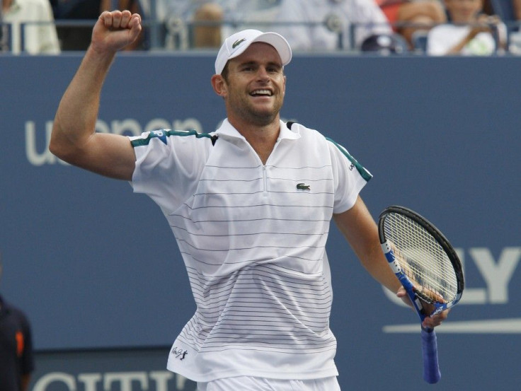 Andy Roddick of the U.S. celebrates his win over Julien Benneteau of France during their match at the U.S. Open tennis tournament in New York