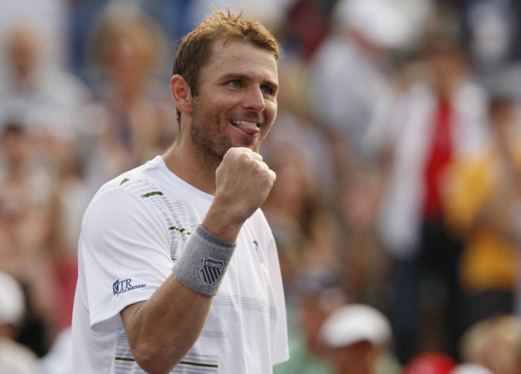 Mardy Fish of the U.S. celebrates after defeating Kevin Anderson of South Africa after their match at the U.S. Open tennis tournament in New York