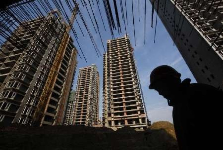 Analysis: China's public housing push takes edge off clampdown