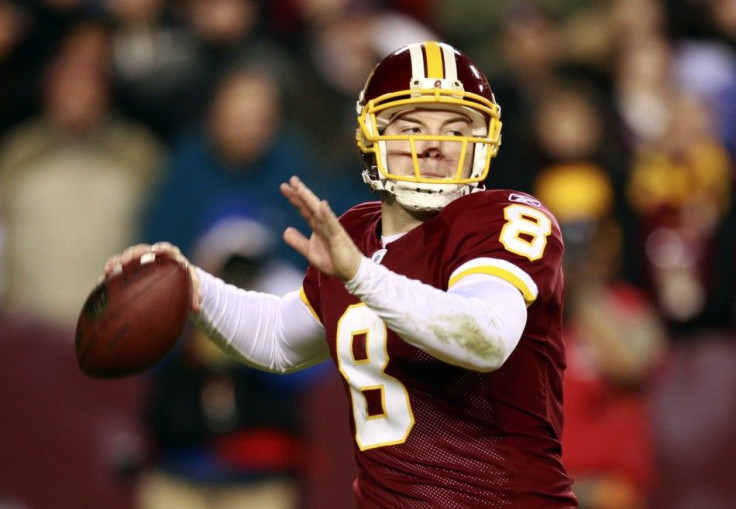 Washington Redskins quarterback Rex Grossman throws during first half against the New York Giants in their NFL football game in Landover