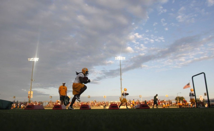 NFL Super Bowl Champions Green Bay Packers take the field for the first training camp practice of the year in Green Bay