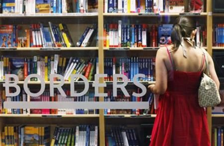 A woman shops inside a Borders bookstore in New York