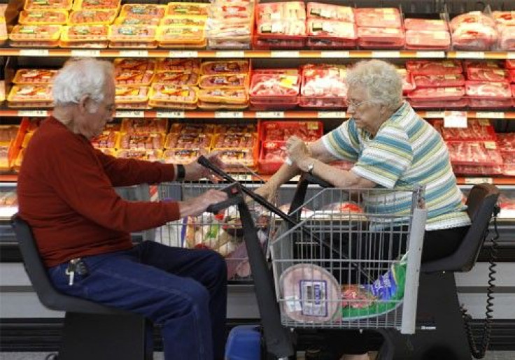Customers shop for meat at Wal-Mart in Rogers, Arkansas