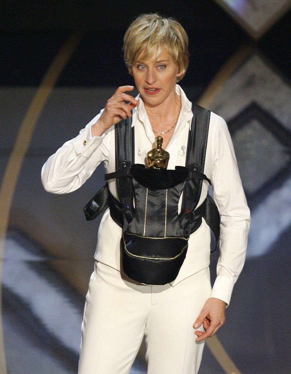 Show host Ellen DeGeneres holds Oscar in baby sling at 79th Annual Academy Awards in Hollywood