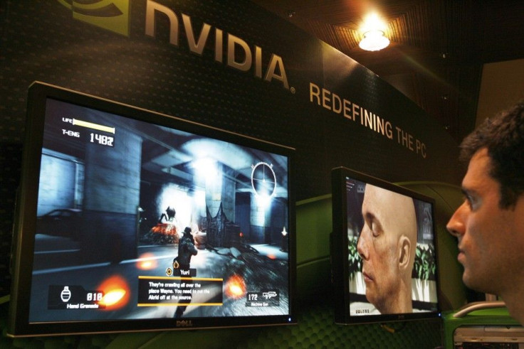 A sells man demonstrates a computer game in a display area of Nvidia Corp. during the second day of the annual 2007 Computex Taipei