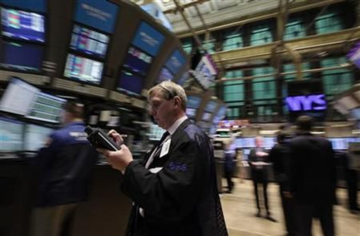 Traders work on the floor of the New York Stock Exchange