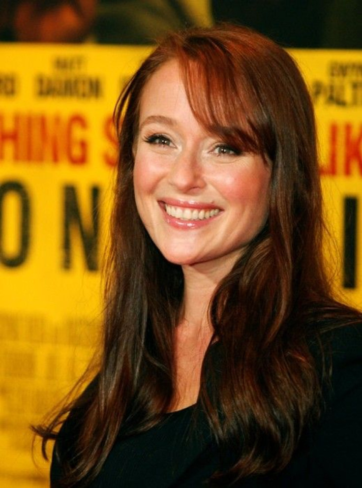 Actress Jennifer Ehle poses as she arrives at the film premiere for &quot;Contagion&quot; in New York 