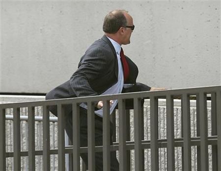 Former UBS banker Bradley Birkenfeld runs into the Federal Courthouse in Ft Lauderdale