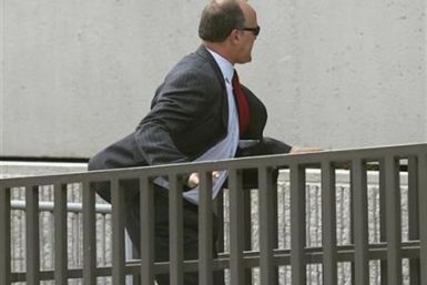 Former UBS banker Bradley Birkenfeld runs into the Federal Courthouse in Ft Lauderdale