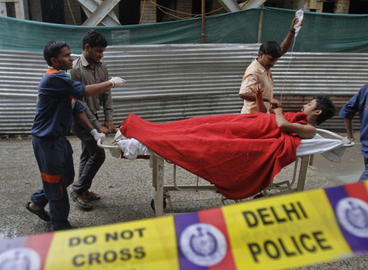 Volunteers carrying an injured man