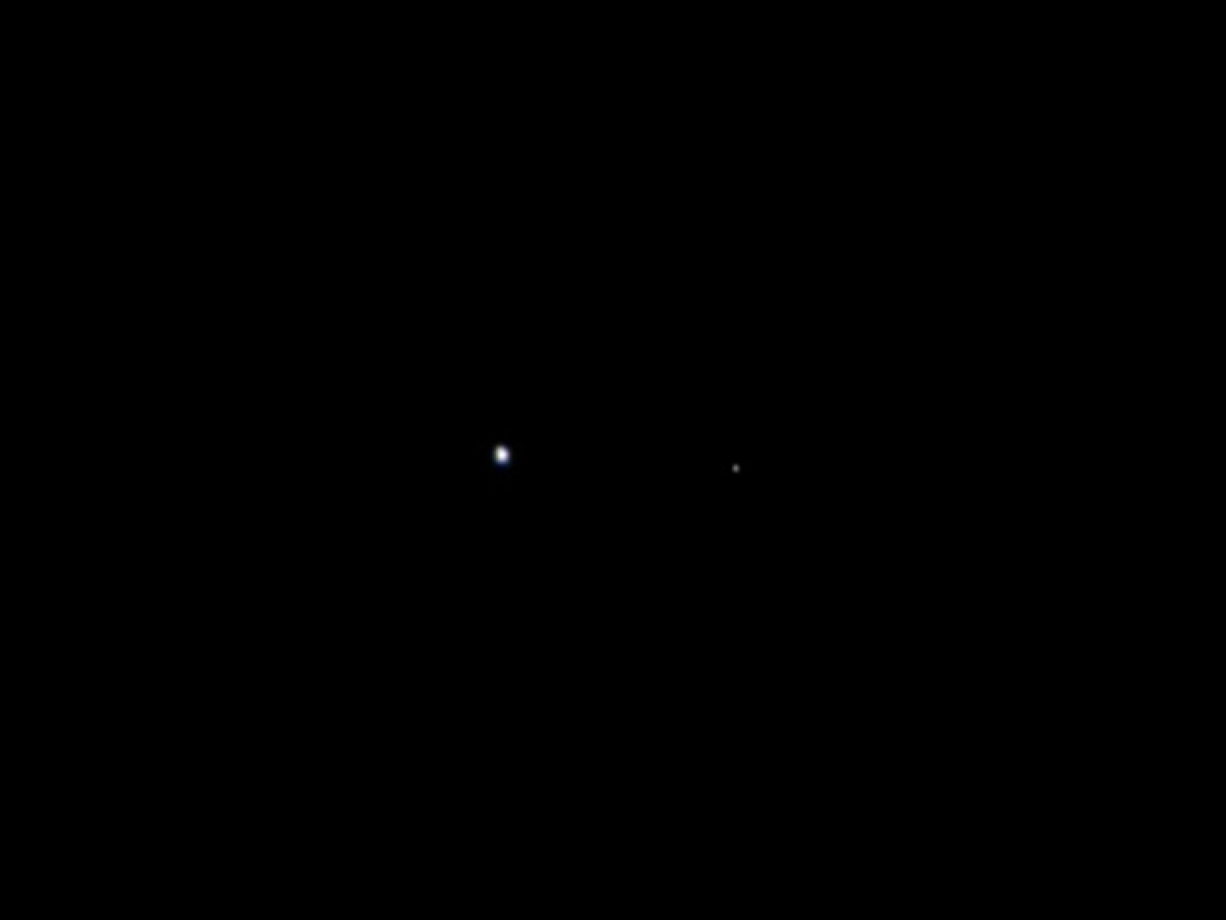 Rare Picture of Earth and Moon Captured by Jupiter-Bound Space Probe Juno