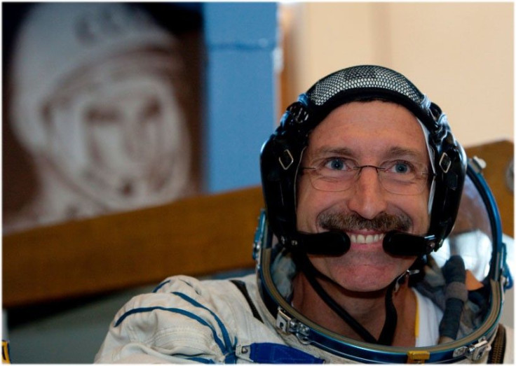 U.S. astronaut Daniel Burbank smiles after taking exams at the Star City space center