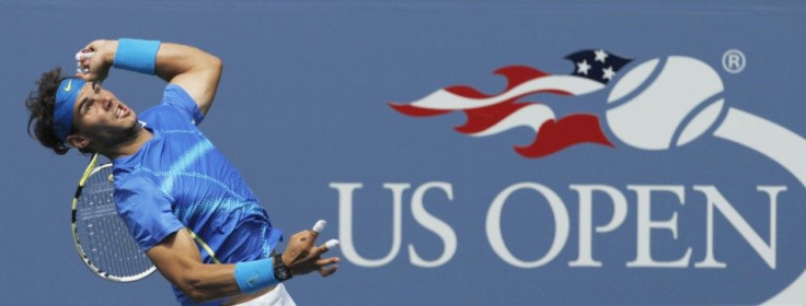 Rafael Nadal of Spain serves to Gilles Muller of Luxembourg during their match at the U.S. Open tennis tournament in New York