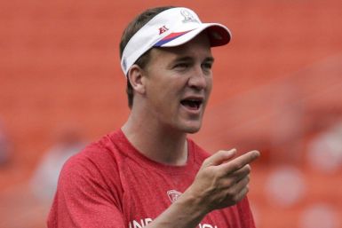 AFC quarterback Peyton Manning of the Indianapolis Colts gestures during a warm-up session before the NFL Pro Bowl in Honolulu
