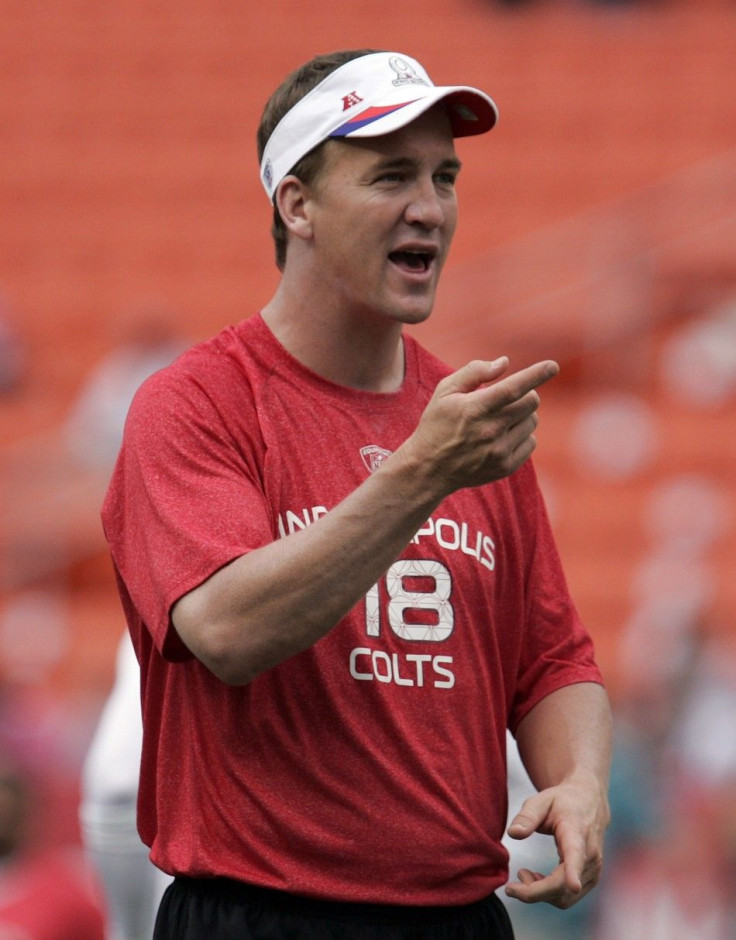 AFC quarterback Peyton Manning of the Indianapolis Colts gestures during a warm-up session before the NFL Pro Bowl in Honolulu