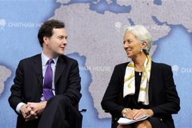 Britain's Chancellor of the Exchequer, Osborne and IMF Managing Director Lagarde speak to each other at Chatham House in central London