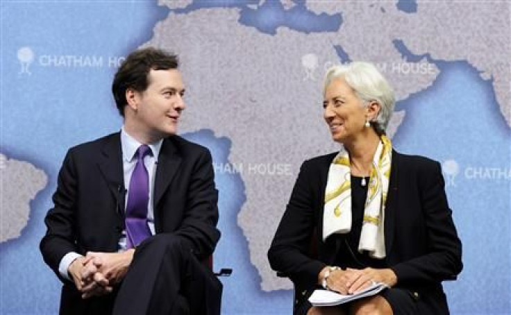 Britain's Chancellor of the Exchequer, Osborne and IMF Managing Director Lagarde speak to each other at Chatham House in central London