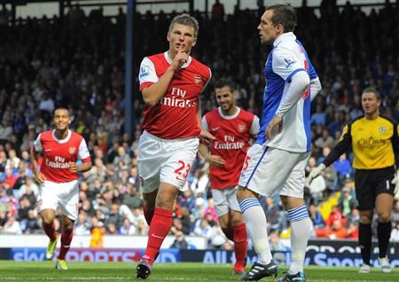 Arsenal's Arshavin celebrates scoring against Blackburn Rovers during their English Premier League soccer match in Blackburn