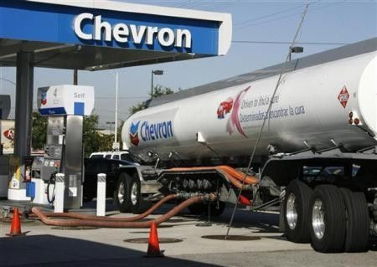 A Chevron tanker truck unloads gasoline into underground storage tanks in Burbank