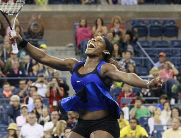 Serena Williams of the U.S. celebrates match point, defeating Caroline Wozniacki of Denmark in their semi-finals match at the U.S. Open tennis tournament in New York