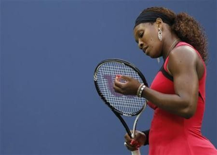 Serena Williams of the U.S. reacts to a missed point to Samantha Stosur of Australia during their finals match at the U.S. Open tennis tournament in New York