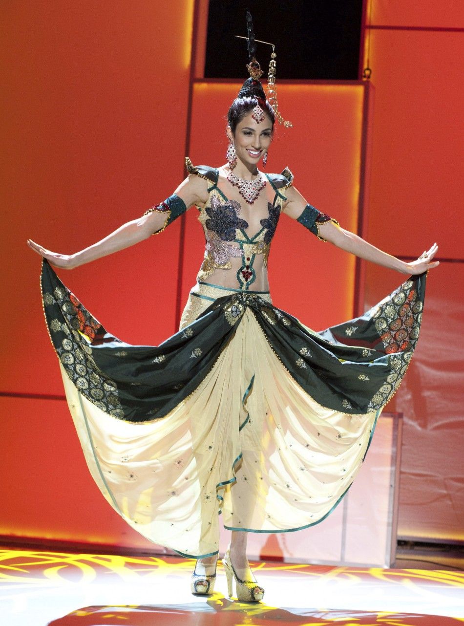 Miss Universe Malaysia 2011 Deborah Henry pre-tapes in her national costume onstage at Credicard Hall in Sao Paulo