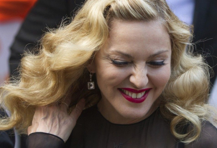 Madonna arrives on the red carpet for the film &quot;W.E.&quot;during Toronto International Film Festival