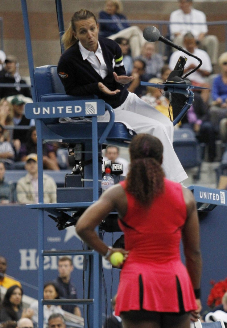 Serena Williams of the U.S. argues with the chair umpire during her match against Samantha Stosur of Australia in the finals at the U.S. Open tennis tournament in New York