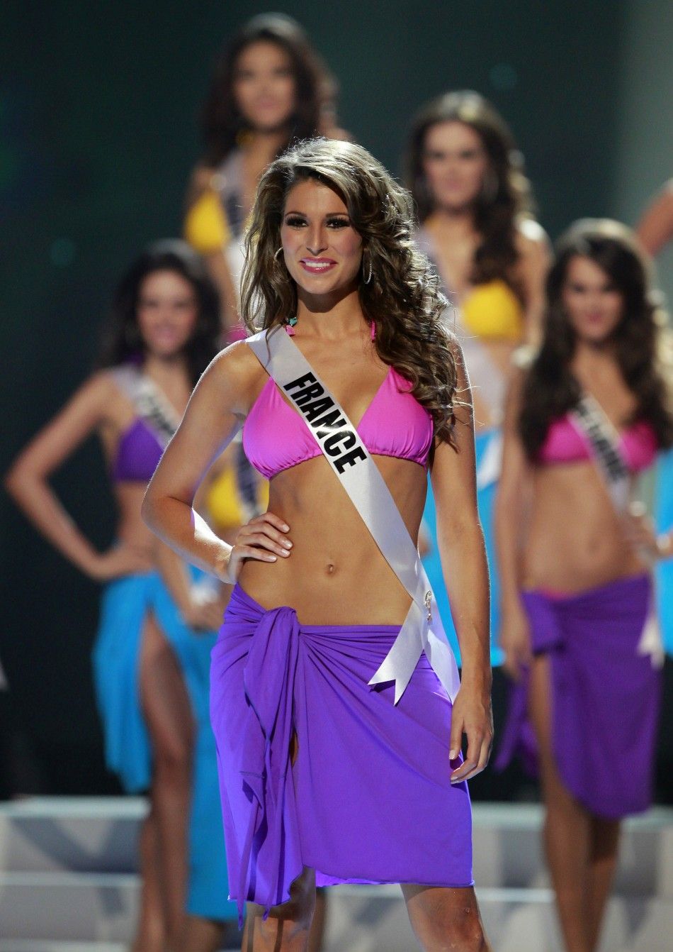 Miss France Laury Thilleman steps forward after being chosen among the final ten contestants of the Miss Universe 2011 pageant in Sao Paulo