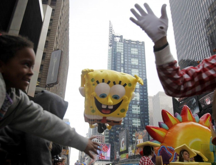 A Spongebob Squarepants balloon makes its way down 7th Avenue during the Macy's Thanksgiving Day Parade in New York