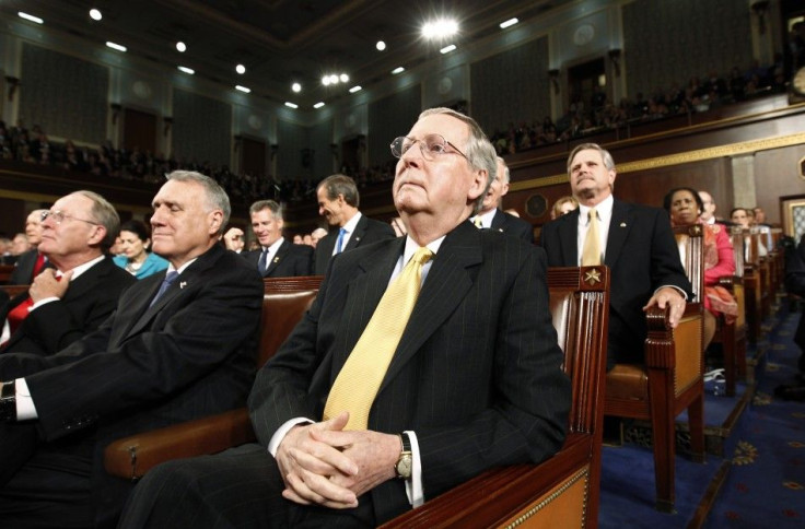 Senate Minority Leader Mitch McConnell (R-KY) listens as President Barack Obama addresses a joint session of the United States Congress in Washington