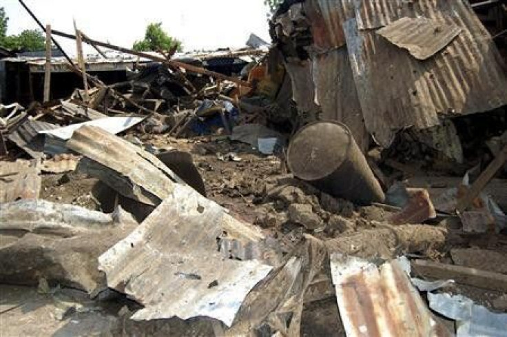 Shattered remnants are seen at the site of a bomb blast at a bar in the Nigerian