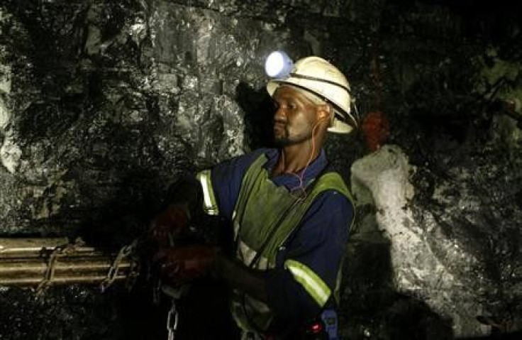 Mine workers is seend underground in Modderfontein east mine, outside Johannesburg