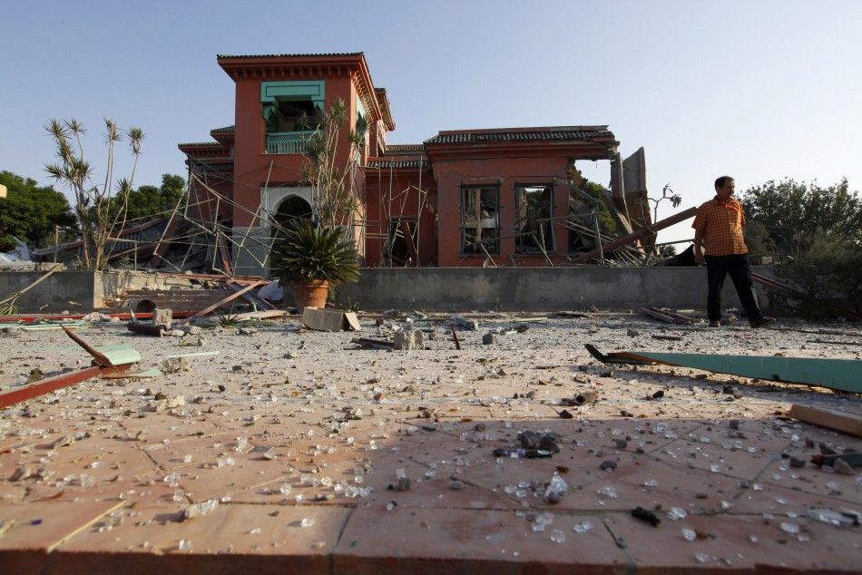 A view is seen of Muammar Gaddafis ransacked country house 15 kilometres south of the capital Tripoli