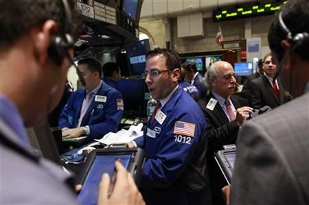 Traders work on the floor of the New York Stock Exchange