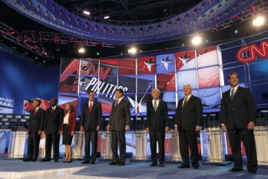 Republican presidential hopefuls take the stage prior to the CNN/Tea Party Republican presidential candidates debate in Tampa