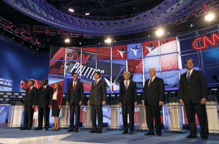 Republican presidential hopefuls take the stage prior to the CNN/Tea Party Republican presidential candidates debate in Tampa