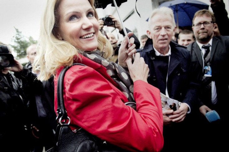 Thorning-Schmidt, leader of Social Democratic Party, and Sovndal, leader of Socialist People&#039;s Party, are seen during an election campaign in Copenhagen