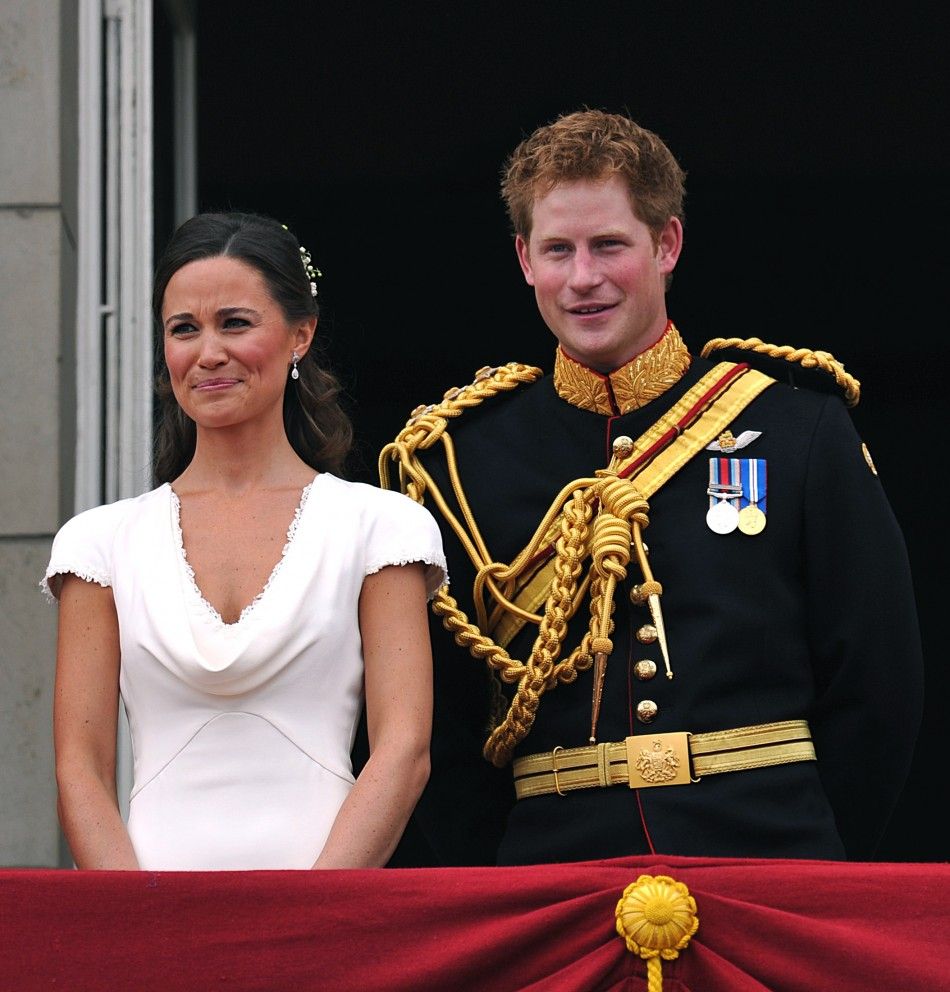 Britains Prince Harry and Pippa Middleton stand on the balcony of Buckingham Palace in London
