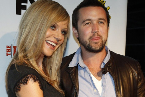 Cast members and married couple Kaitlin Olson and Rob McElhenney pose at the seventh season premiere screening of the FX cable television series &quot;It's Always Sunny in Philadelphia&quot; in Hollywood