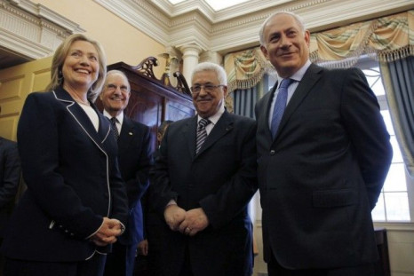 US Secretary of State Hillary Clinton (L) hosts Israel's Prime Minister Benjamin Netanyahu (R), President of the Palestinian Authority Mahmoud Abbas (2nd R) and George Mitchell, US Special Envoy for Middle East Peace (2nd L) in the Monroe Room 