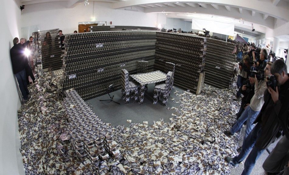 A flat made from about 300,000 beer mats