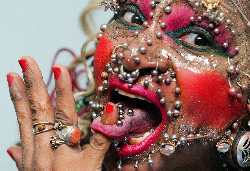 Woman with the greatest number of body piercings