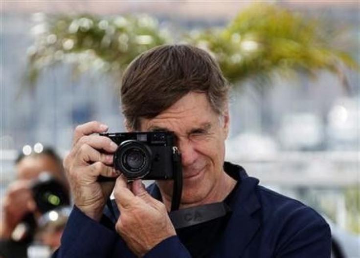 Director Gus Van Sant takes pictures during a photocall for the film &#039;&#039;Restless&#039;&#039; in competition for the category &#039;&#039;Un Certain Regard&#039;&#039; at the 64th Cannes Film Festival